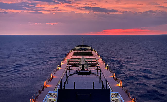 freighter at sunrise on the Great Lakes